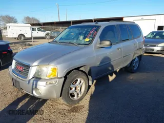 2006 GMC Envoy SLT with VIN 1GKDS13S162220330, listed as a IAAI auction lot 41401322 with 190,756 mi miles. Bid and sale history available at carsss.com. Image 2.
