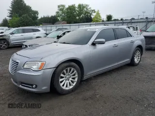 2013 Chrysler 300 with VIN 2C3CCAAG2DH630338, listed as a Copart auction lot 59656835 with 143,298 mi miles and Salvage title. Bid and sale history available at DreamBid. Image 1.