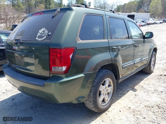 2007 Jeep Grand Cherokee Laredo with VIN 1J8GS48K67C512160, listed as a IAAI auction lot 41892105 with 204,308 mi miles. Bid and sale history available at carsss.com. Image 4.