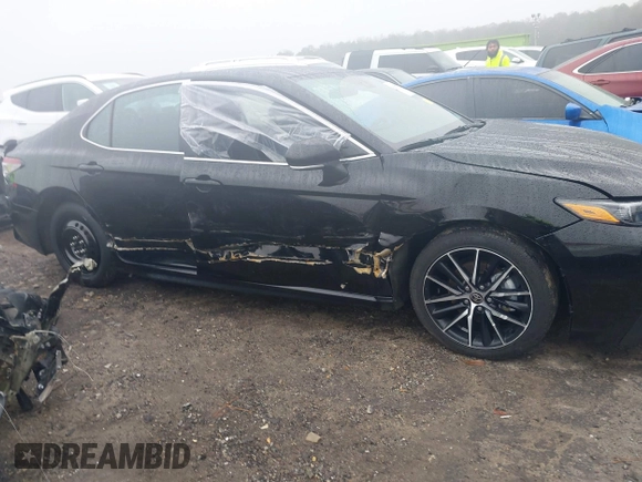 2023 Toyota Camry SE z VIN 4T1G11AK0PU809322, wystawiony jako IAAI lot #41056512 z przebiegiem 33 159 mil mil oraz . Historia ofert i sprzedaży dostępna na DreamBid. Obrazek 6.