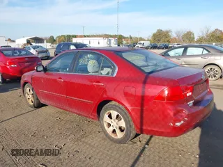 2009 Kia Optima LX z VIN KNAGE228995289603, wystawiony jako IAAI lot #40716738 z przebiegiem 209 904 mil mil oraz . Historia ofert i sprzedaży dostępna na DreamBid. Obrazek 3.