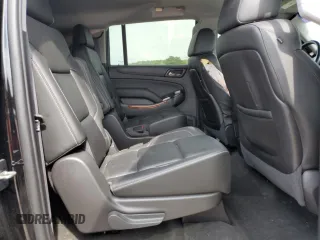 2015 Chevrolet Suburban LTZ with VIN 1GNSKKKC1FR624679, listed as a Copart auction lot 52957365 with 71,194 mi miles and Salvage Title. Bid and sale history available at DreamBid. Image 11.