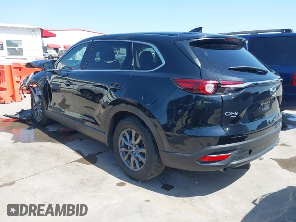 2023 Mazda CX-9 Touring with VIN JM3TCBCY2P0651679, listed as a IAAI auction lot 42002920 with 67,791 mi miles and . Bid and sale history available at DreamBid. Image 3.