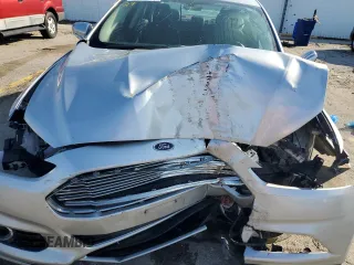 2014 Ford Fusion Titanium with VIN 3FA6P0K90ER228580, listed as a Copart auction lot 49986585 with Not Provided miles and Salvage Title. Bid and sale history available at DreamBid. Image 12.
