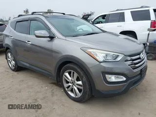 2015 Hyundai Santa Fe z VIN 5XYZW4LA9FG283826, wystawiony jako IAAI lot #42289253 z przebiegiem 120 369 mil mil oraz . Historia ofert i sprzedaży dostępna na DreamBid. Obrazek 1.