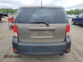 2012 Scion xB z VIN JTLZE4FE1CJ014494, wystawiony jako Copart lot #57779675 z przebiegiem 151 857 mil mil oraz Szkody całkowita. Historia ofert i sprzedaży dostępna na DreamBid. Obrazek 6.