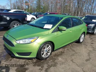 2018 Ford Focus SE with VIN 1FADP3FE7JL237818, listed as a IAAI auction lot 41729205 with 66,702 mi miles. Bid and sale history available at carsss.com. Image 2.