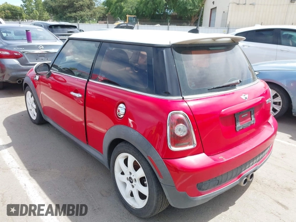 2009 MINI Hardtop S with VIN WMWMF73559TW87548, listed as a IAAI auction lot 42346174 with 132,361 mi miles and . Bid and sale history available at DreamBid. Image 3.