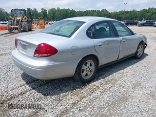 2006 Ford Taurus SE z VIN 1FAFP53UX6A105350, wystawiony jako IAAI lot #42363631 z przebiegiem 107 825 mil mil oraz . Historia ofert i sprzedaży dostępna na DreamBid. Obrazek 4.