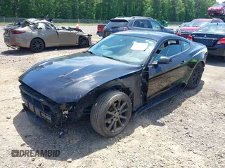 2019 Ford Mustang EcoBoost with VIN 1FA6P8TH4K5159573, listed as a IAAI auction lot 42207962 with 121,225 mi miles and . Bid and sale history available at DreamBid. Image 18.