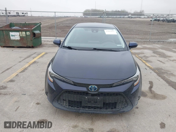 2021 Toyota Corolla Hybrid LE with VIN JTDEAMDE9MJ003172, listed as a IAAI auction lot 42062851 with 96,753 mi miles. Bid and sale history available at carsss.com. Image 13.