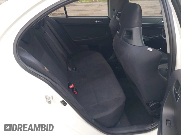 2013 Mitsubishi Lancer Evolution GSR z VIN JA32W8FV0DU023509, wystawiony jako IAAI lot #42222552 z przebiegiem 128 030 mil mil oraz . Historia ofert i sprzedaży dostępna na DreamBid. Obrazek 8.