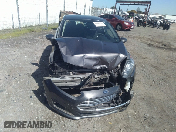 2018 Ford Fiesta SE with VIN 3FADP4EJ0JM141953, listed as a IAAI auction lot 38529613 with 74,502 mi miles and . Bid and sale history available at DreamBid. Image 6.