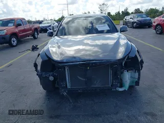 2014 Infiniti Q50 Premium with VIN JN1BV7AP7EM684448, listed as a IAAI auction lot 42564087 with 79,207 mi miles and . Bid and sale history available at DreamBid. Image 6.