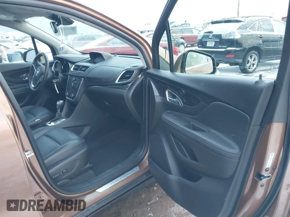2016 Buick Encore Leather with VIN KL4CJCSB0GB571295, listed as a IAAI auction lot 41121647 with 30,936 mi miles. Bid and sale history available at carsss.com. Image 5.