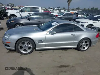 2004 Mercedes-Benz SL 500 with VIN WDBSK75F44F071115, listed as a IAAI auction lot 42565805 with 80,201 mi miles and . Bid and sale history available at DreamBid. Image 14.