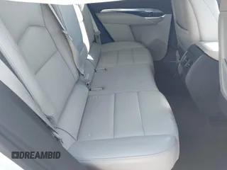 2019 Cadillac XT4 FWD Luxury z VIN 1GYAZAR4XKF170642, wystawiony jako IAAI lot #41585684 z przebiegiem 74 512 mil mil oraz . Historia ofert i sprzedaży dostępna na DreamBid. Obrazek 8.