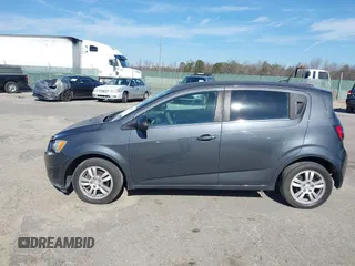 2013 Chevrolet Sonic LT with VIN 1G1JC6SB1D4164944, listed as a IAAI auction lot 41496975 with 96,987 mi miles. Bid and sale history available at carsss.com. Image 12.