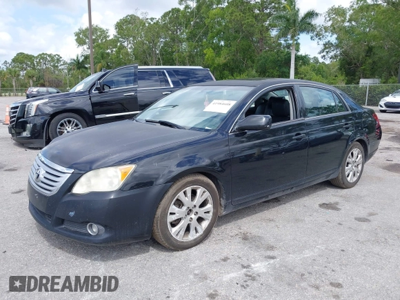 2010 Toyota Avalon XL with VIN 4T1BK3DB1AU353725, listed as a IAAI auction lot 41984608 with 153,759 mi miles and . Bid and sale history available at carsss.com. Image 2.