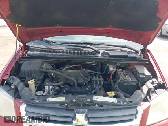 2010 Dodge Grand Caravan SXT with VIN 2D4RN5D17AR145958, listed as a IAAI auction lot 42125450 with 229,790 mi miles and . Bid and sale history available at DreamBid. Image 10.