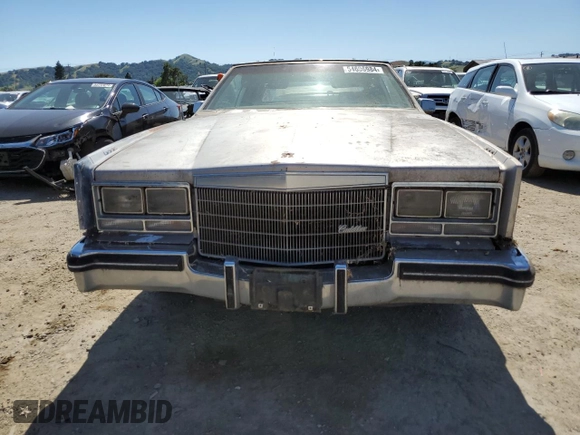 1985 Cadillac Eldorado z VIN 1G6EL578XFE661216, wystawiony jako Copart lot #54606984 z przebiegiem 12 462 mil mil oraz Szkoda całkowita • Salvage title. Historia ofert i sprzedaży dostępna na DreamBid. Obrazek 5.