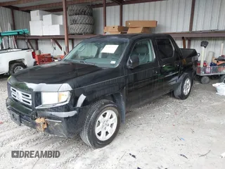 2007 Honda Ridgeline RTL with VIN 2HJYK16547H549241, listed as a IAAI auction lot 42282477 with 214,685 mi miles and . Bid and sale history available at DreamBid. Image 2.