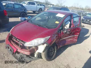 2013 Ford Fiesta SE with VIN 3FADP4EJ0DM171765, listed as a IAAI auction lot 42106666 with 149,873 mi miles and . Bid and sale history available at DreamBid. Image 2.