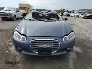 2001 Chrysler LHS z VIN 2C3AC56G61H589389, wystawiony jako Copart lot #58993363 z przebiegiem 175 064 mil mil oraz Szkody całkowita. Historia ofert i sprzedaży dostępna na DreamBid. Obrazek 5.