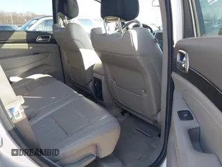 2011 Jeep Grand Cherokee Laredo z VIN 1J4RR4GG2BC511289, wystawiony jako IAAI lot #41240075 z przebiegiem 88 140 mil mil oraz . Historia ofert i sprzedaży dostępna na DreamBid. Obrazek 8.