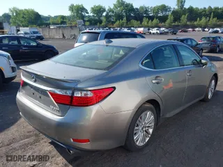 2015 Lexus ES 350 with VIN JTHBK1GGXF2188338, listed as a IAAI auction lot 36552431 with NaN miles. Bid and sale history available at carsss.com. Image 4.