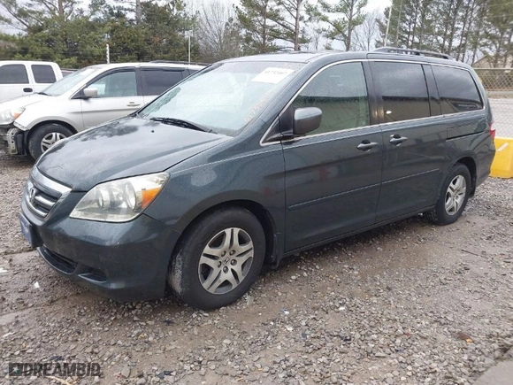 2005 Honda Odyssey EX-L with VIN 5FNRL38745B047221, listed as a IAAI auction lot 41732407 with 275,604 mi miles. Bid and sale history available at carsss.com. Image 2.