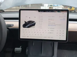 2024 Tesla Model Y Performance with VIN 7SAYGDEF7RF020203, listed as a IAAI auction lot 41639077 with 14,493 mi miles and . Bid and sale history available at DreamBid. Image 18.