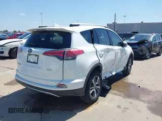 2018 Toyota RAV4 XLE with VIN JTMWFREV7JJ199383, listed as a IAAI auction lot 41859890 with 41,408 mi miles. Bid and sale history available at carsss.com. Image 4.