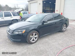 2013 Volkswagen Passat SE w/Sunroof with VIN 1VWBH7A31DC113637, listed as a IAAI auction lot 41854340 with 188,606 mi miles. Bid and sale history available at carsss.com. Image 2.