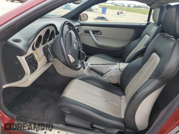 1999 Mercedes-Benz SLK-Class with VIN WDBKK47F0XF132802, listed as a Copart auction lot 69818544 with 123,026 mi miles and Salvage Title. Bid and sale history available at carsss.com. Image 7.