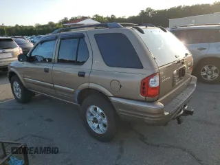 2001 Isuzu Rodeo S with VIN 4S2CK58W314334096, listed as a Copart auction lot 68262924 with 140,657 mi miles and Salvage Title. Bid and sale history available at DreamBid. Image 2.