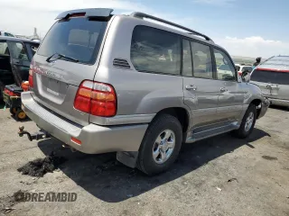 2001 Toyota Land Cruiser with VIN JTEHT05J312011815, listed as a Copart auction lot 58303244 with 211,972 mi miles and Salvage Title. Bid and sale history available at carsss.com. Image 3.