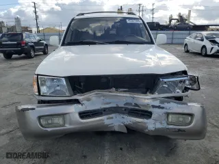 1999 Toyota Land Cruiser with VIN JT3HT05J7X0049786, listed as a Copart auction lot 45527005 with 199,447 mi miles and Salvage Title. Bid and sale history available at carsss.com. Image 5.