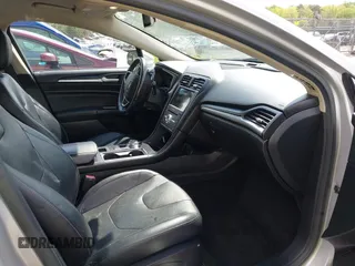 2017 Ford Fusion Titanium with VIN 3FA6P0K90HR266556, listed as a IAAI auction lot 41947924 with 135,628 mi miles. Bid and sale history available at carsss.com. Image 5.