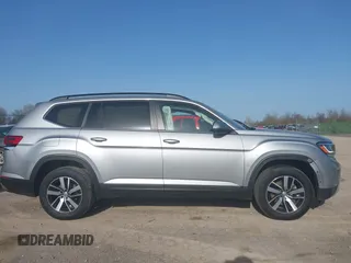 2021 Volkswagen Atlas SE z VIN 1V2LP2CA1MC538847, wystawiony jako IAAI lot #42134093 z przebiegiem 66 678 mil mil oraz . Historia ofert i sprzedaży dostępna na DreamBid. Obrazek 13.
