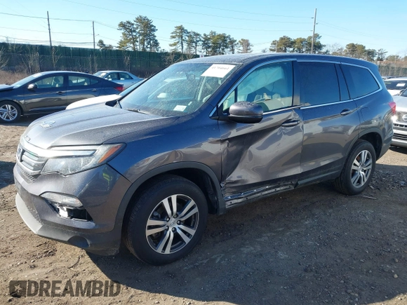 2017 Honda Pilot EX-L with VIN 5FNYF6H59HB101815, listed as a IAAI auction lot 41704661 with 130,479 mi miles and . Bid and sale history available at DreamBid. Image 19.