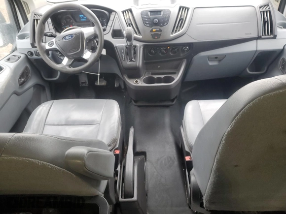 2018 Ford Transit with VIN 1FTYE1YM9JKA25907, listed as a Copart auction lot 46324975 with 253,828 mi miles and Salvage title. Bid and sale history available at DreamBid. Image 8.