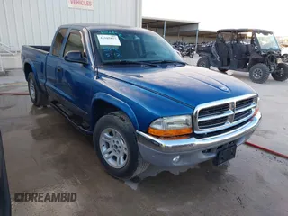 2003 Dodge Dakota SLT with VIN 1D7HL42N93S196397, listed as a IAAI auction lot 42105857 with 159,690 mi miles. Bid and sale history available at carsss.com. Image 1.