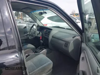 2003 Chevrolet Tracker ZR2 with VIN 2CNBJ734536931923, listed as a IAAI auction lot 41641054 with 111,247 mi miles and . Bid and sale history available at DreamBid. Image 5.