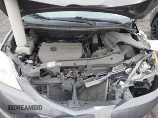 2010 Mazda 5 Sport with VIN JM1CR2WLXA0370650, listed as a IAAI auction lot 41602072 with 142,611 mi miles and . Bid and sale history available at DreamBid. Image 10.