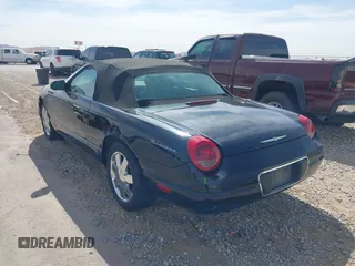 2002 Ford Thunderbird w/Hardtop Premium with VIN 1FAHP60A72Y129115, listed as a IAAI auction lot 41768100 with 54,393 mi miles. Bid and sale history available at carsss.com. Image 14.
