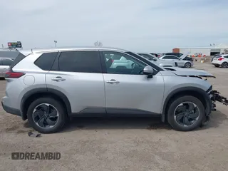 2024 Nissan Rogue SV with VIN JN8BT3BA9RW351981, listed as a IAAI auction lot 41801994 with 124,638 mi miles and . Bid and sale history available at carsss.com. Image 13.