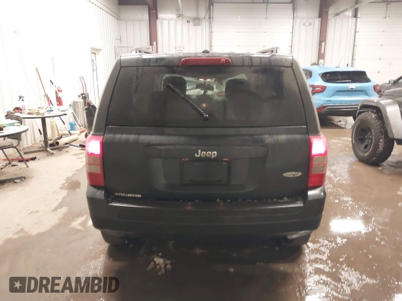 2014 Jeep Patriot Latitude with VIN 1C4NJPFA6ED737327, listed as a IAAI auction lot 41611577 with 88,407 mi miles and . Bid and sale history available at carsss.com. Image 16.