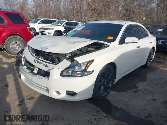 2013 Nissan Maxima SV with VIN 1N4AA5AP4DC821476, listed as a IAAI auction lot 41782887 with 140,956 mi miles and . Bid and sale history available at DreamBid. Image 2.