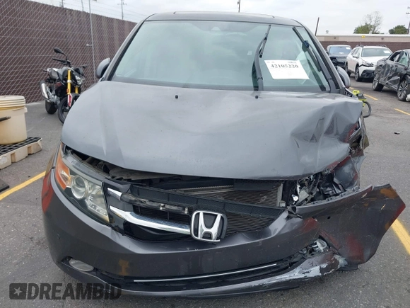 2014 Honda Odyssey Touring with VIN 5FNRL5H97EB114634, listed as a IAAI auction lot 42105220 with Not Provided miles and . Bid and sale history available at carsss.com. Image 11.